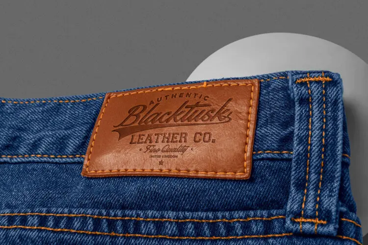 Jeans Leather Label Mockup 照片级逼真牛仔裤皮革标签徽标服装品牌和纺织品品牌模型